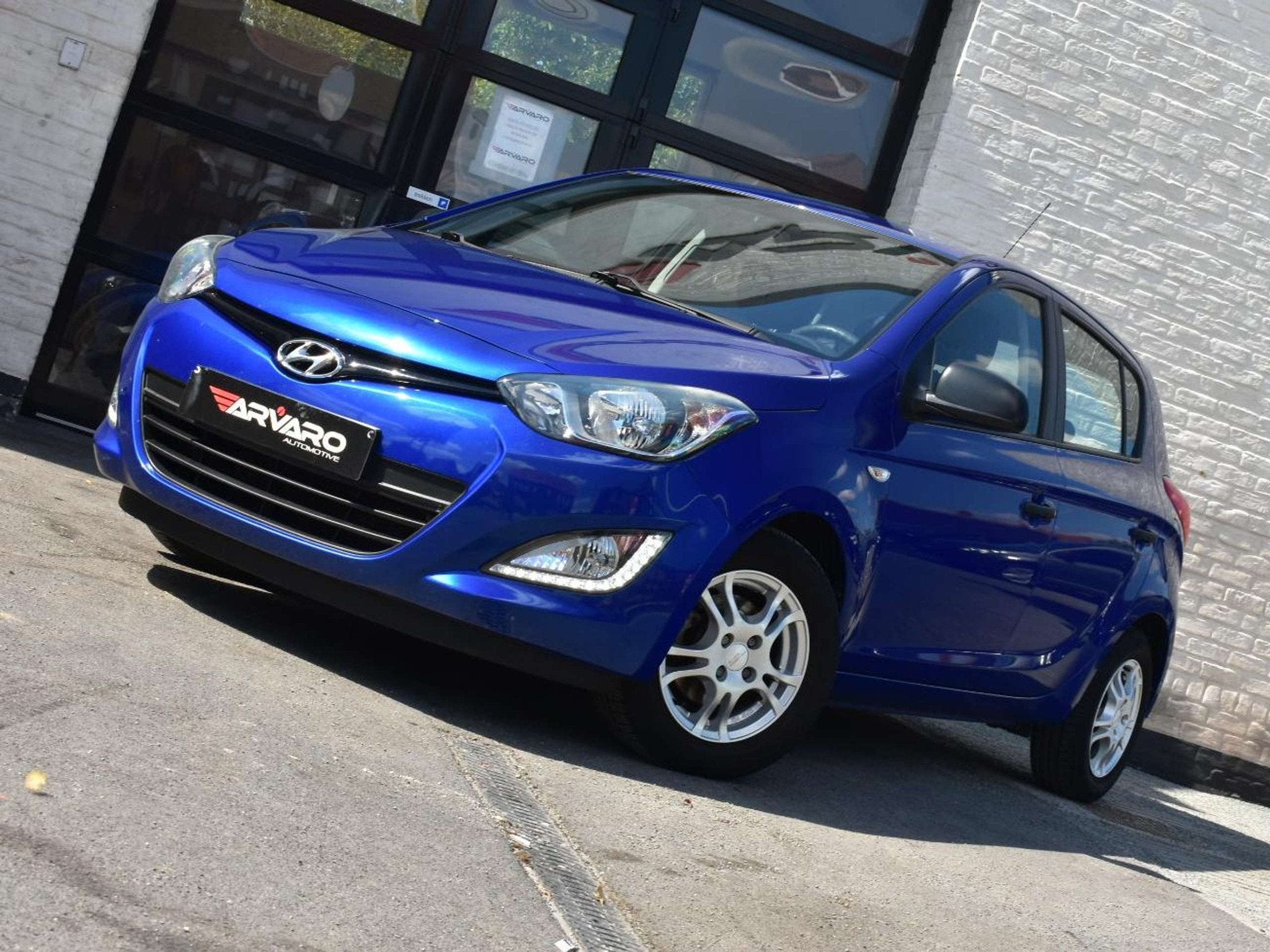 Hyundai i20 1.2i Lounge / Verw Zetels / Airco / Topstaat / G, Autos, Hyundai, Euro 5, Entreprise, Boîte manuelle, Noir