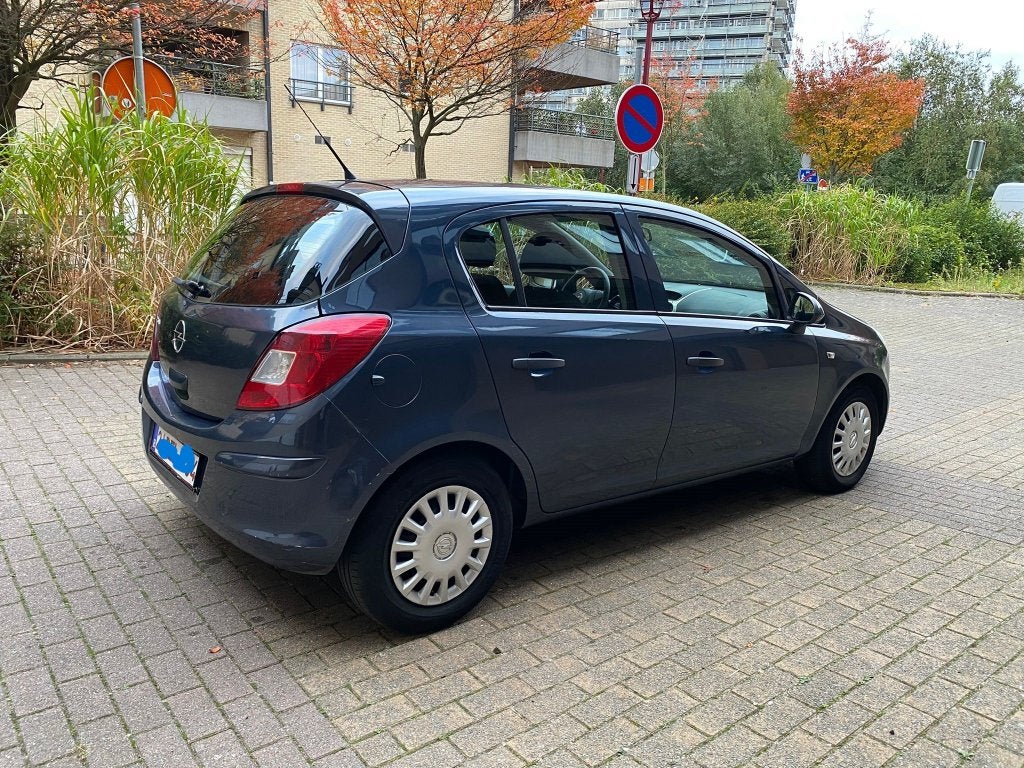 Opel Corsa 5-deurs Benzine Lez 2030, Auto's, Euro 4, Zilver of Grijs, Corsa, Testrit aan huis