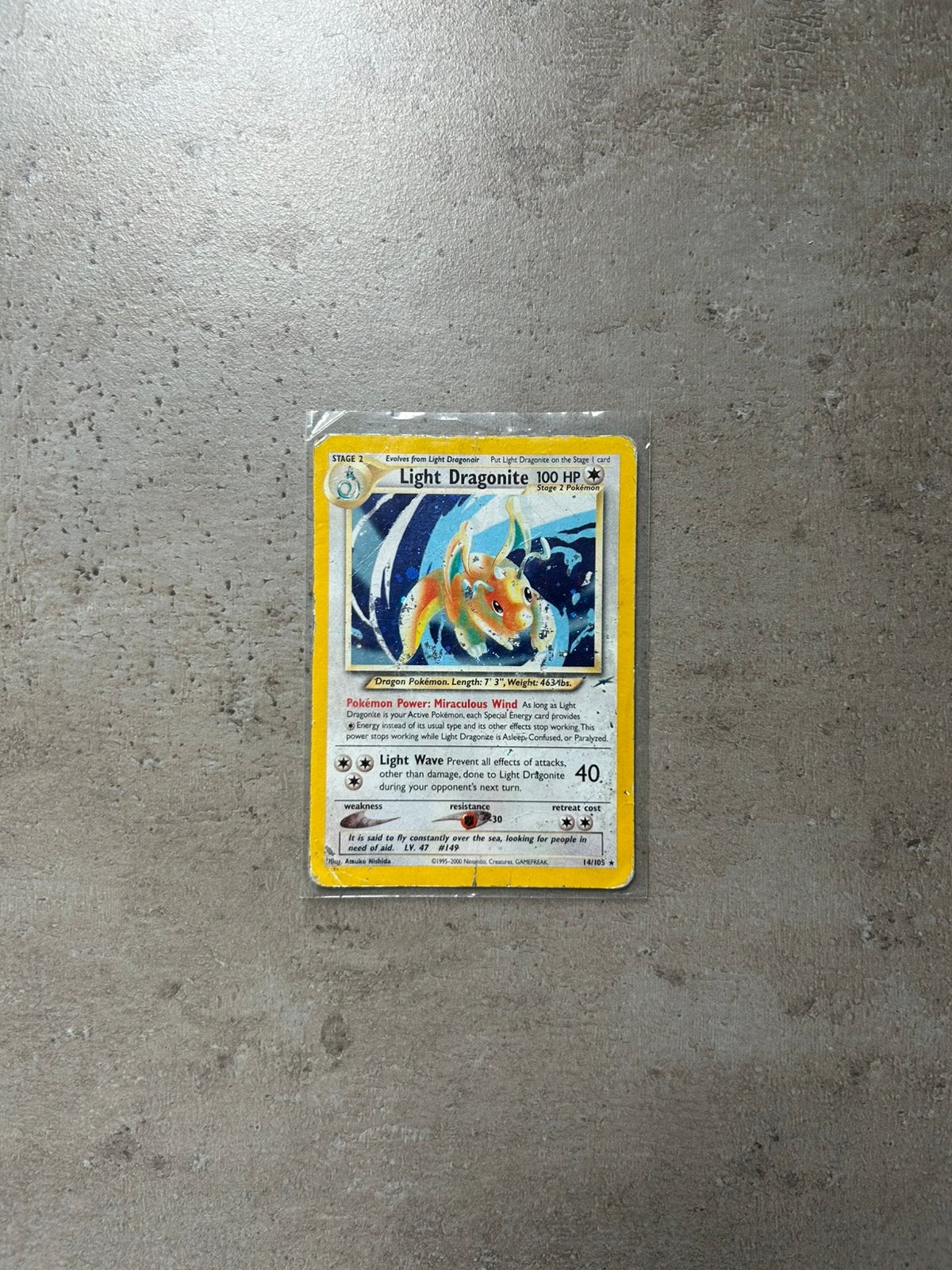 Pokemon kaart - light dragonite, Ophalen of Verzenden, Zo goed als nieuw, Losse kaart, Foil