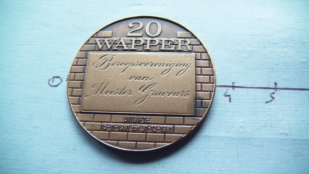 médaille 20 wapper 1981, Enlèvement