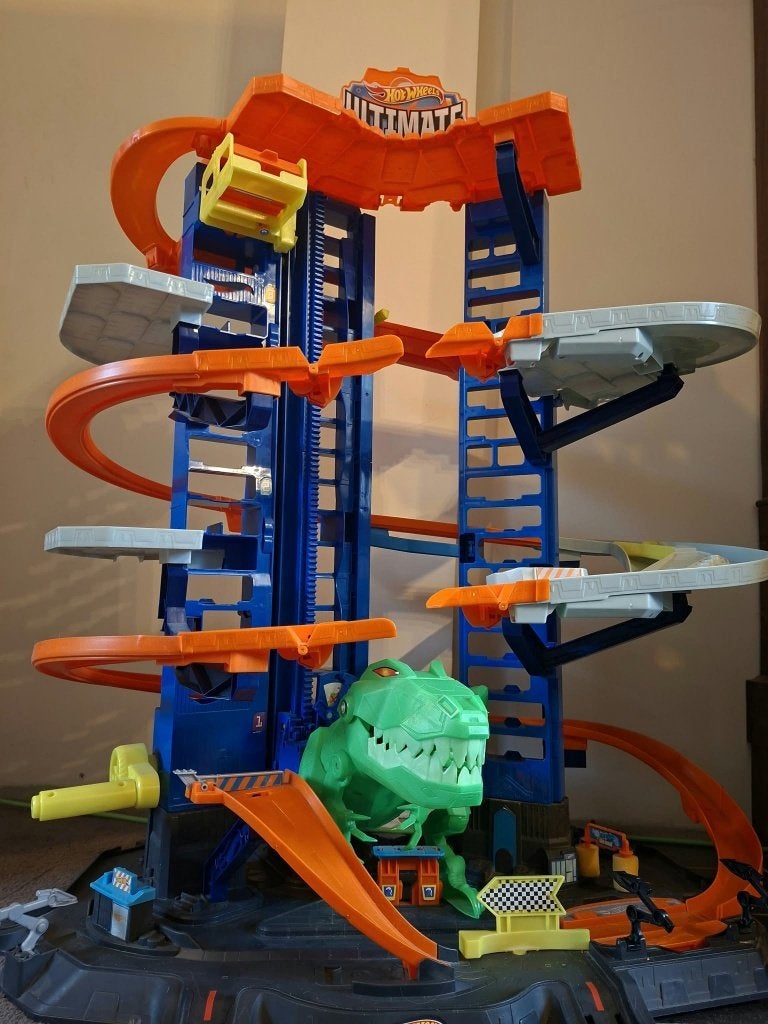 Hot Wheels Ultimate Garage T-Rex ( GJL14 ) - Werkt Perfect, Enfants & Bébés, Comme neuf, Enlèvement, Circuit, Hot Wheels