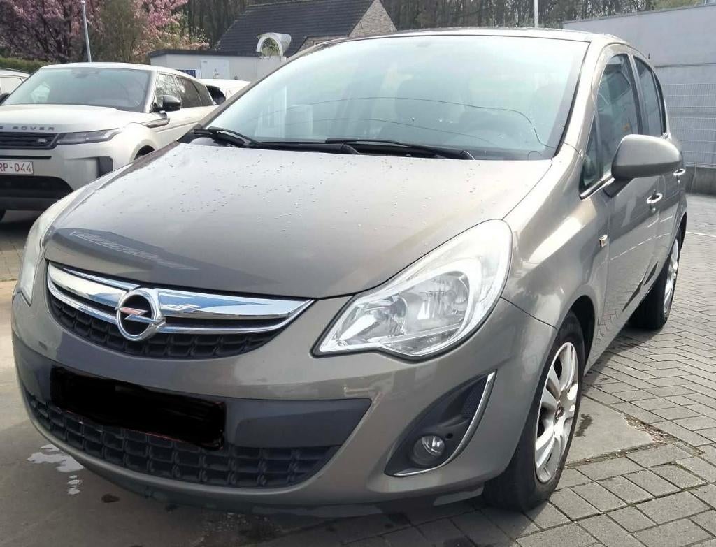 Opel Corsa 1.2 2012 1e prop 5p airco gps 100.000km, Auto's, Euro 5, Zwart, 62 kW, 5 zetels