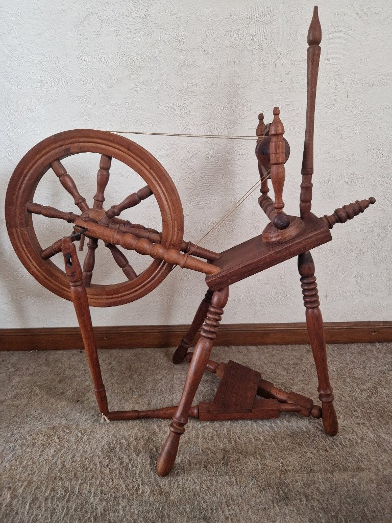 Antiek spinnewiel, Ophalen