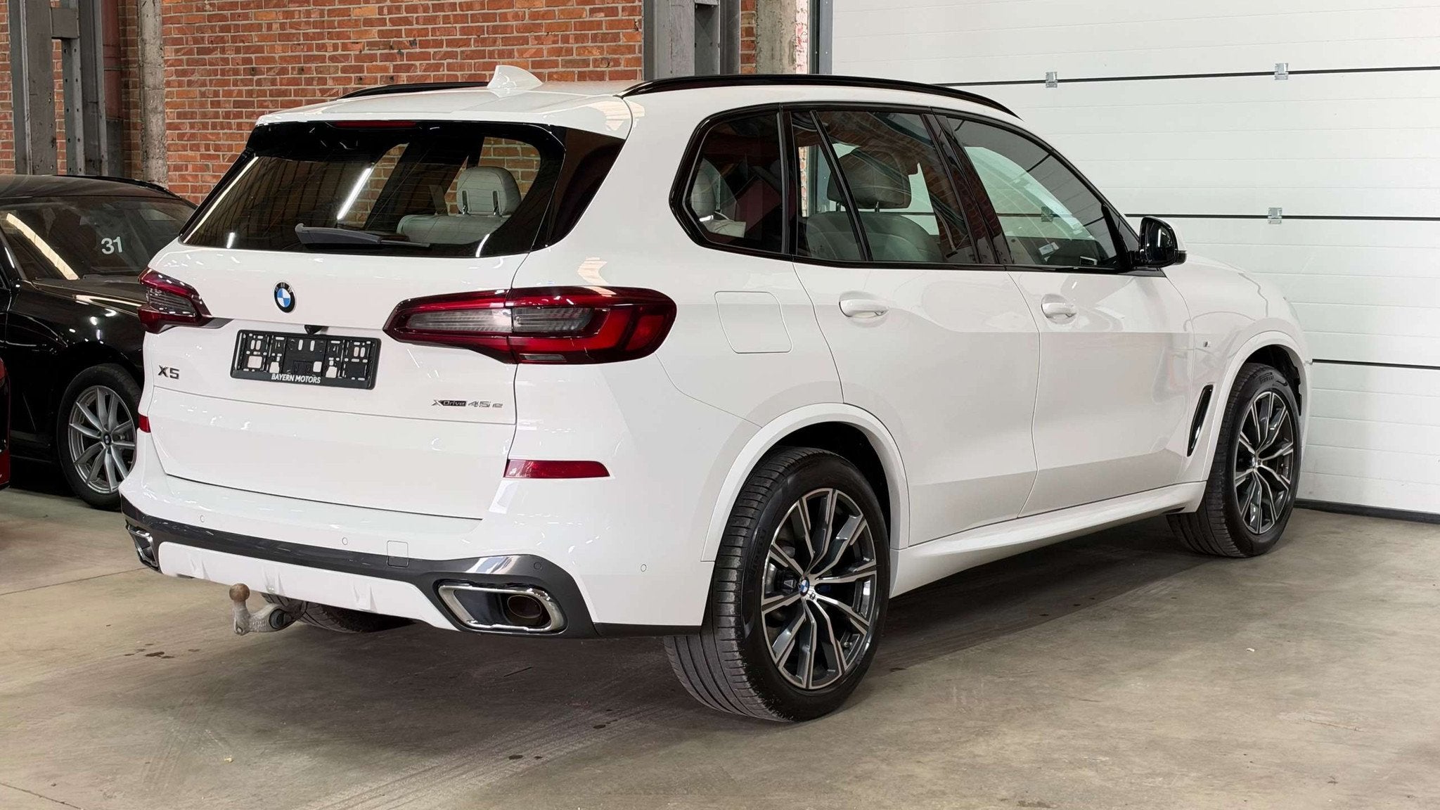 BMW X5 PHEV|3.0A xDrive45e|87.000km|2021|M-Pakket|SOH 89%, Auto's, Gebruikt, Wit, Leder, 5 zetels