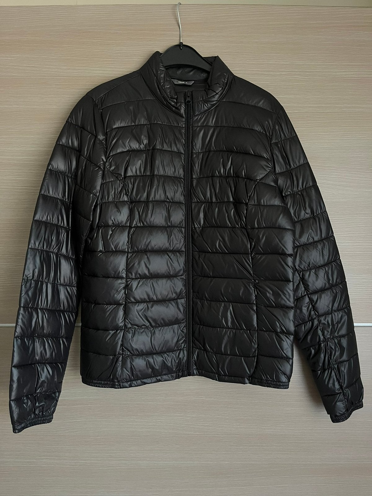 Zwarte donsjas Hema - maat L, Ophalen of Verzenden, Nieuw, Maat 42/44 (L), Zwart