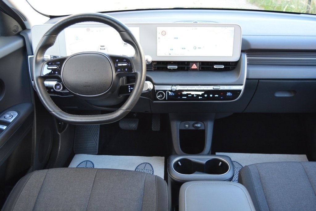 Hyundai IONIQ5 58KW Navi, Adaptive cruise, Apple Carplay, Auto's, Dealer onderhouden, Stof, Zwart, 5 deurs