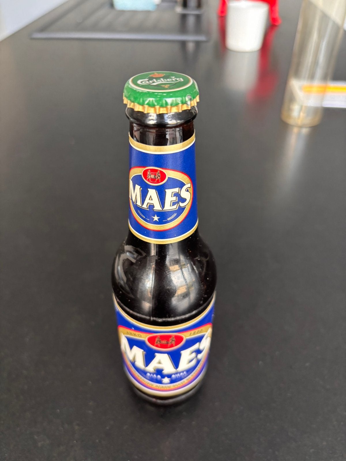 Maes pils fles 2006 met carlsberg kroonkurk, Ophalen of Verzenden, Zo goed als nieuw