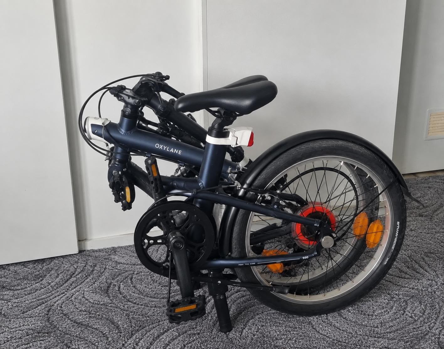 Zwarte vouwfiets 🚲Merk :OXYLANE, Ophalen, Zo goed als nieuw, Maxi-Cosi, Isofix