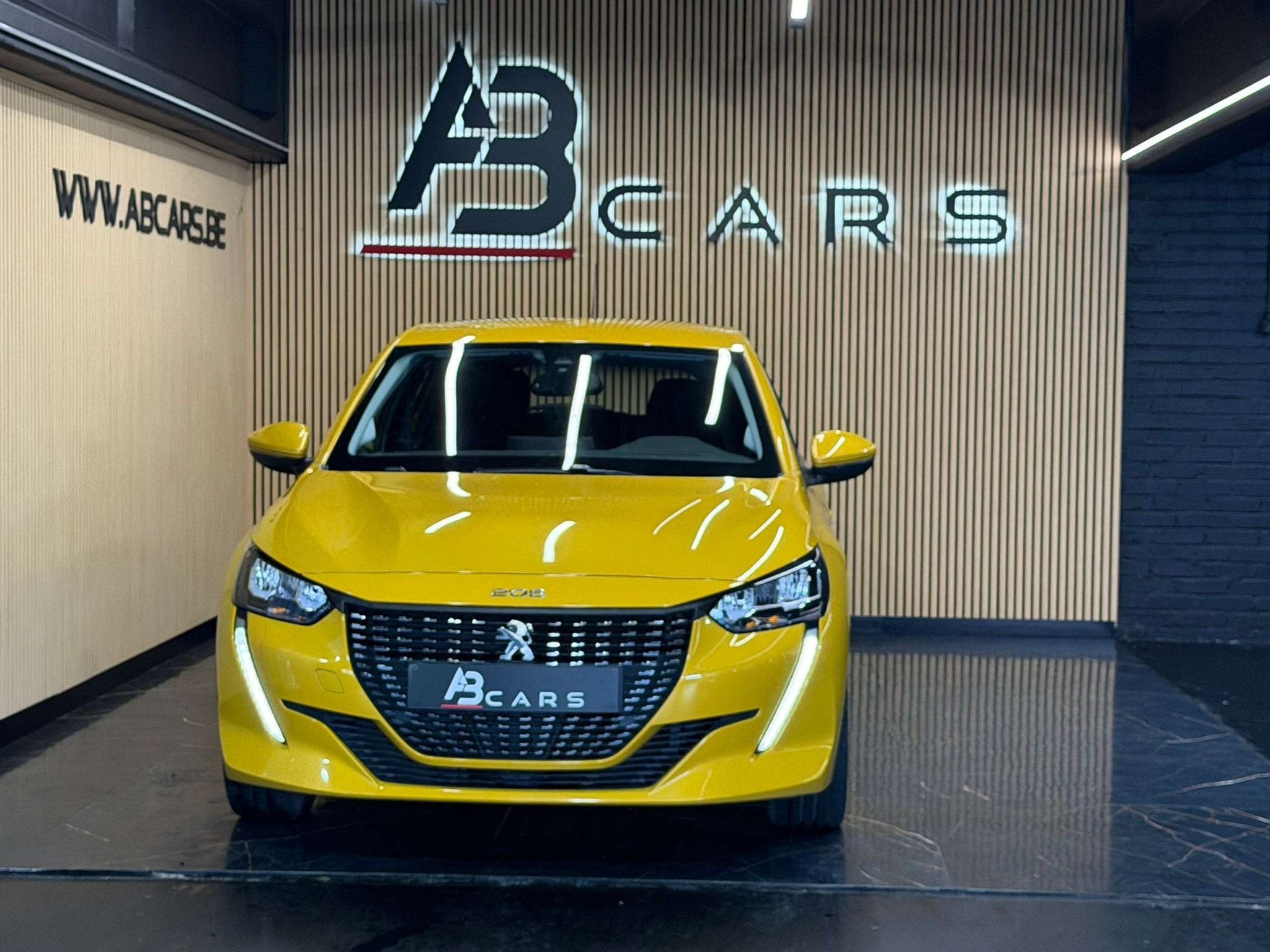 Peugeot 208 1.2i * SPORT * GARANTIE 12 MOIS * 1ER PROP *, Auto's, Stof, 1199 cc, Geel, Bedrijf