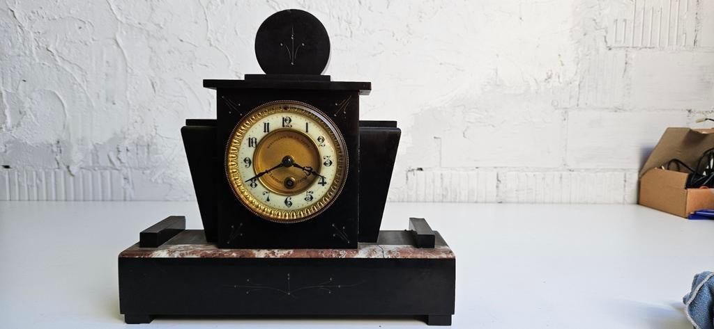 zeer oude klok met marmer, Ophalen