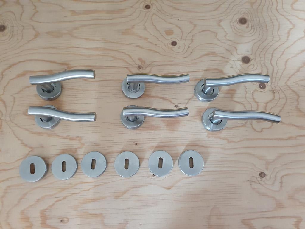 4 deurkrukken in zilverkleurig metaal, Ophalen of Verzenden, Zo goed als nieuw, Inox, Klink of Kruk