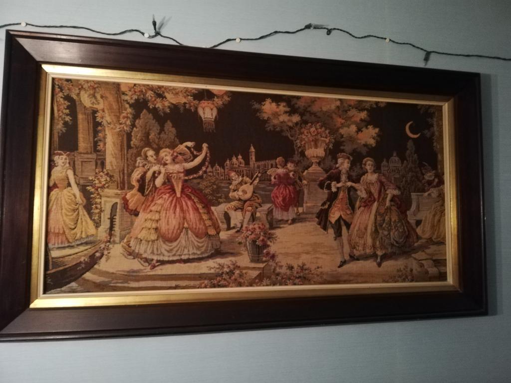 Schilderij dansende figuren op textiel, Ophalen