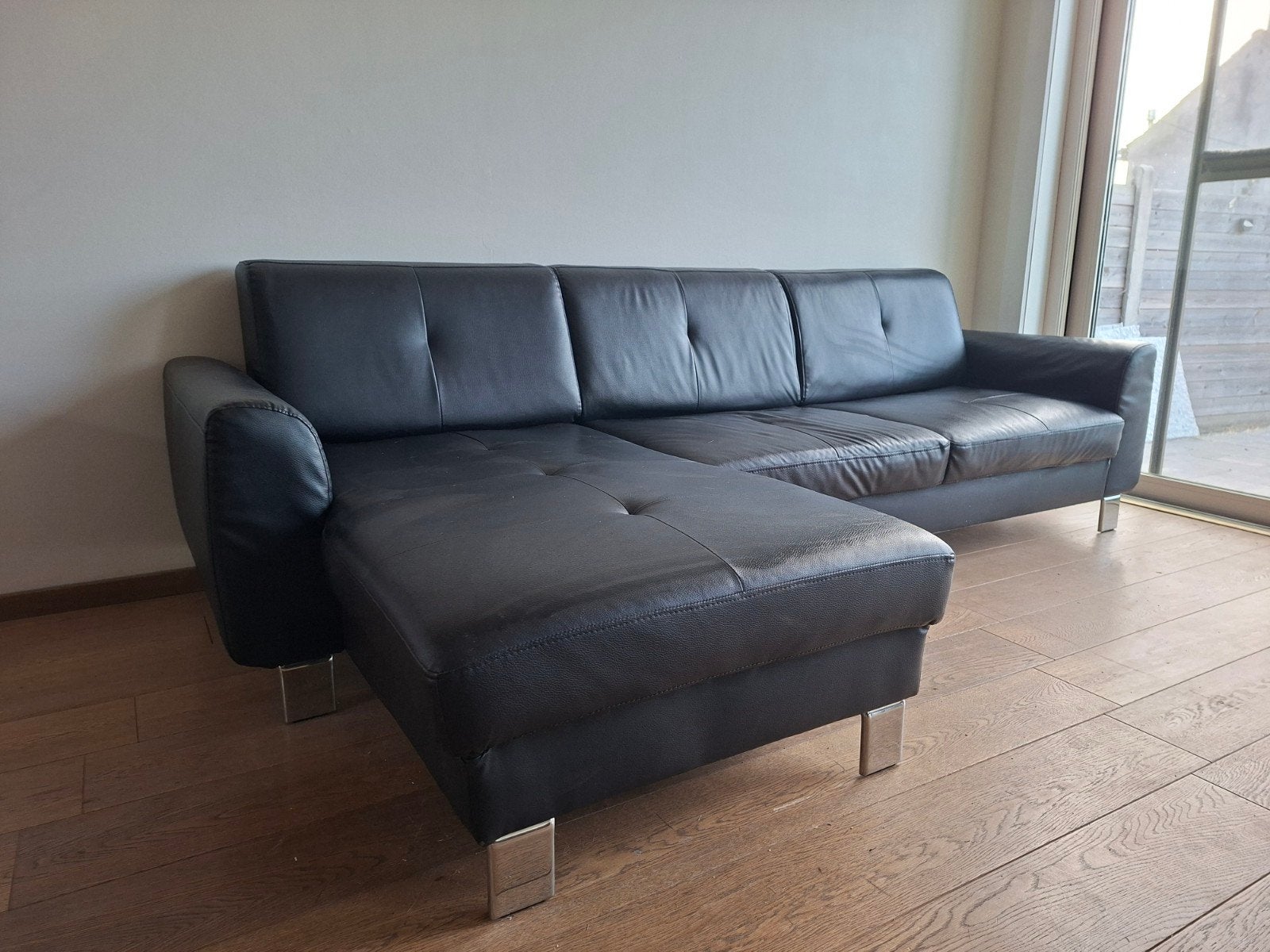 Degelijke zetel in zwart kunstleer, Enlèvement