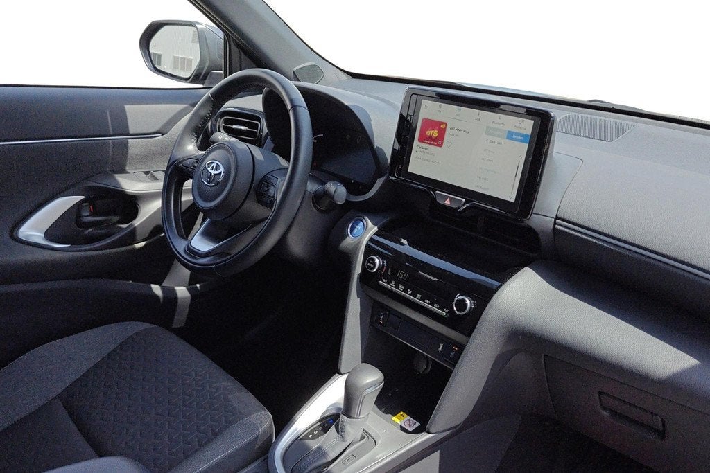 Toyota Yaris Cross 1.5 VVT-ie Hybrid 85kW Dynamic Plus CVT +, Auto's, Stof, Gebruikt, 116 pk, 5 zetels