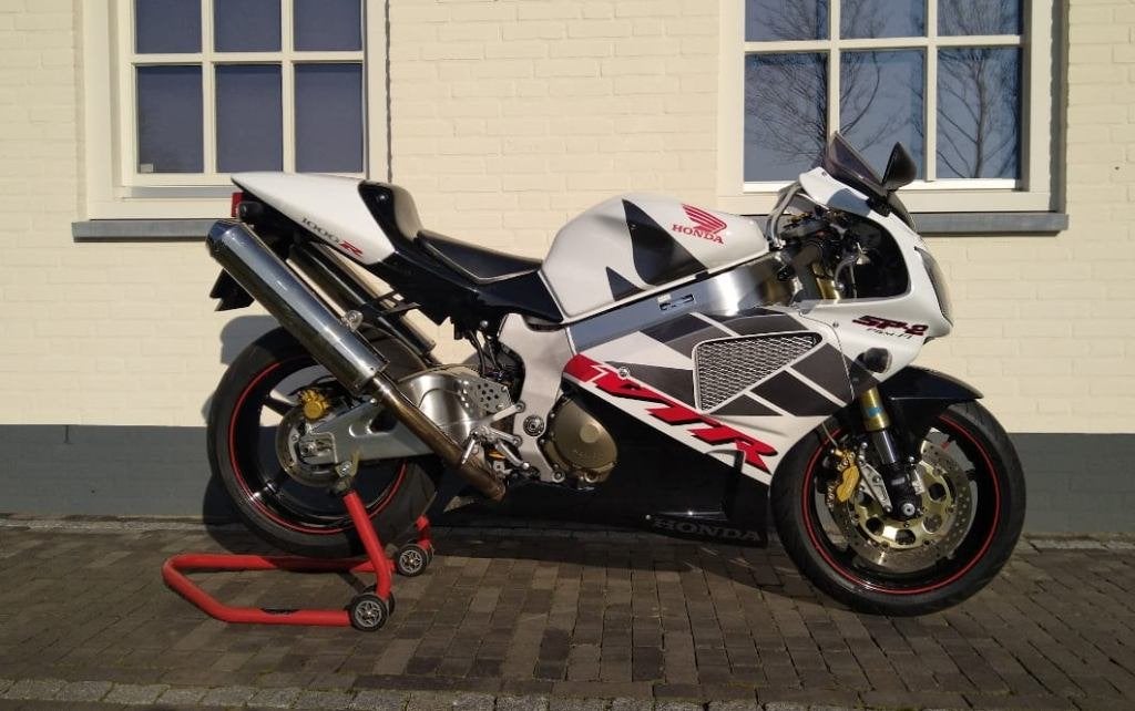 HONDA VTR 1000 SP-2, Occasion, 2 cylindres, Super Sport, Particulier