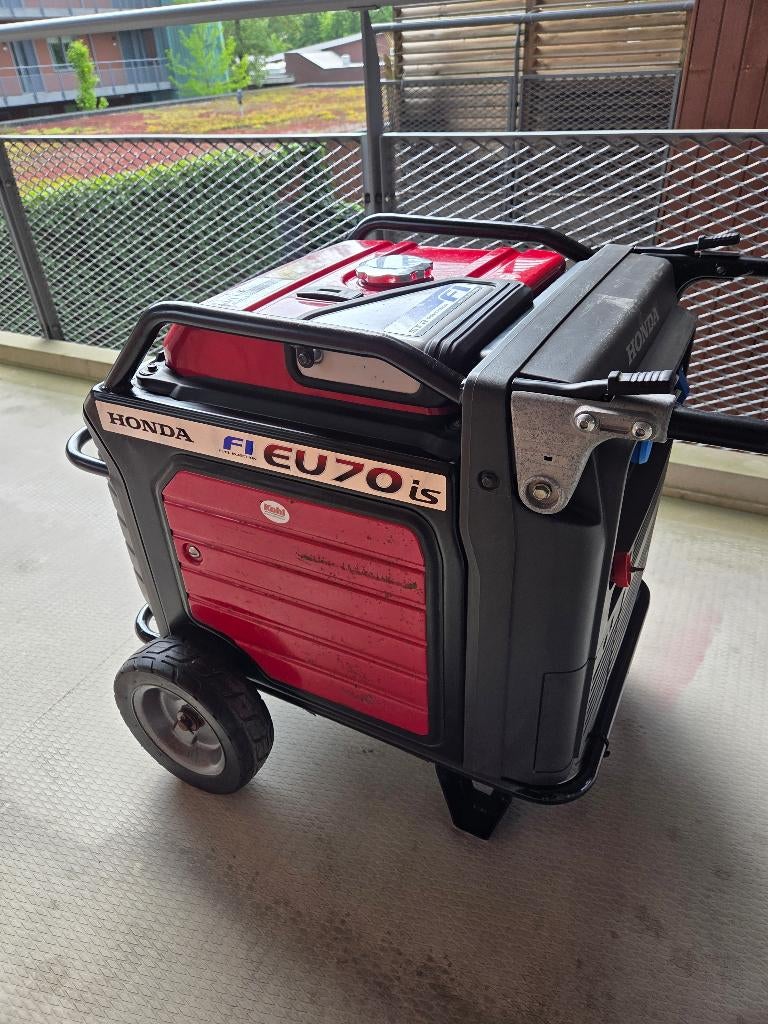 Honda EU70is stroomgroep aggregaat generator, 5 à 10 kVA, Démarrage électrique, Comme neuf, Enlèvement