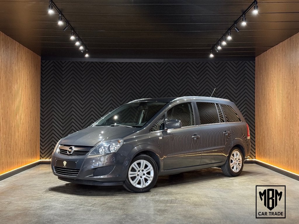 ✅Opel Zafira 1.6i GARANTIE 7 Zits Airco Trekhaak Parkeersens, Voorwielaandrijving, Zwart, 4 cilinders, 7 zetels