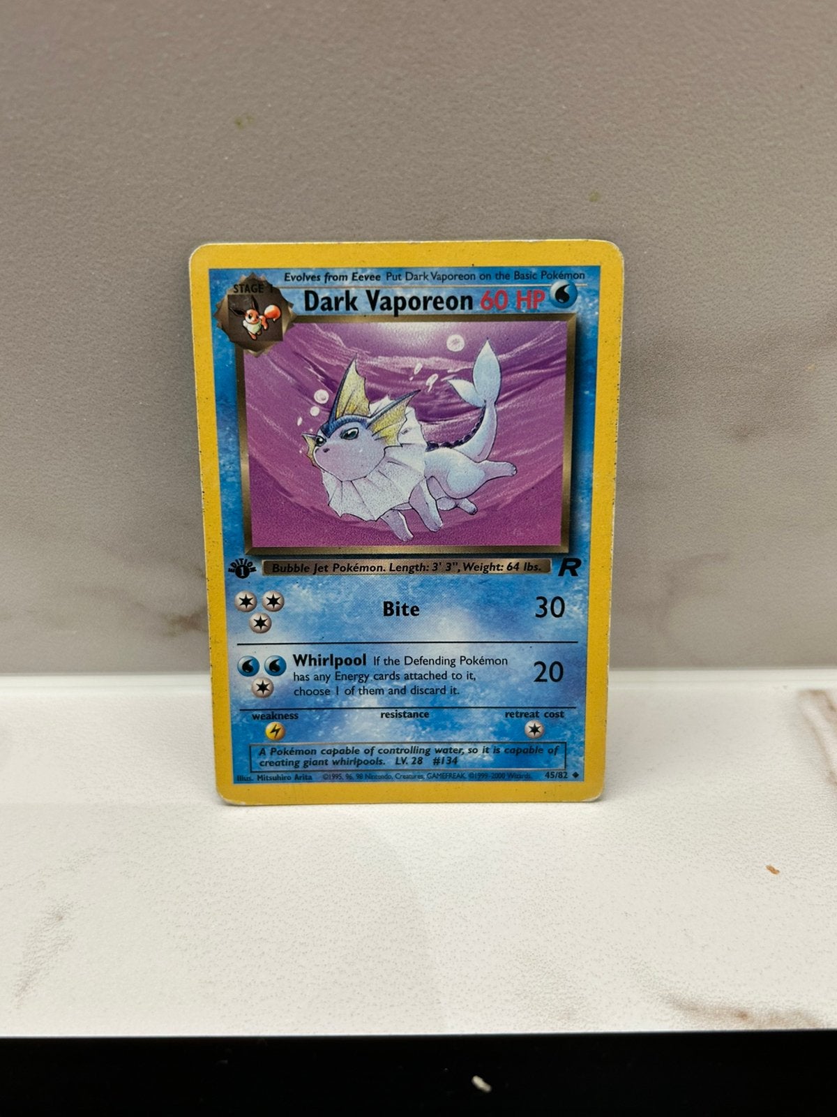 Dark Vaporeon team rocket first edition 45/82 played, Enlèvement ou Envoi, Utilisé, Cartes en vrac