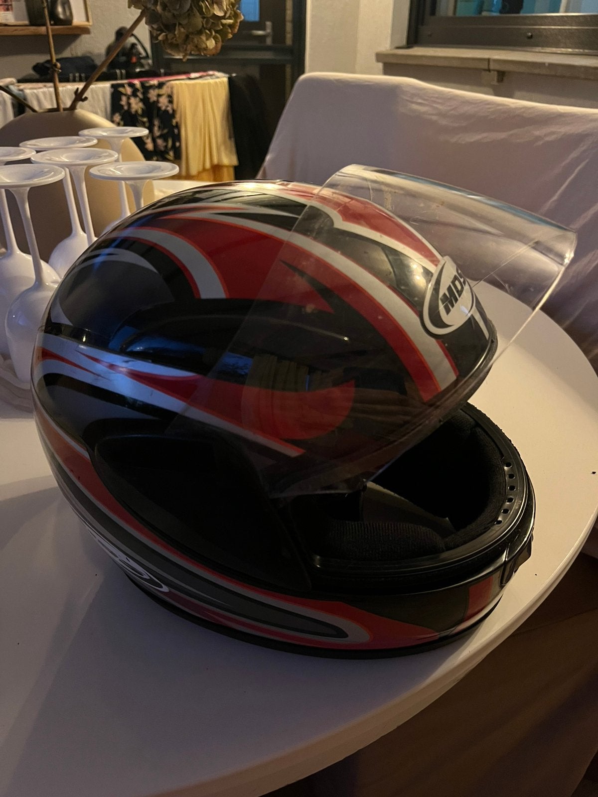 Motorhelm te koop, Ophalen