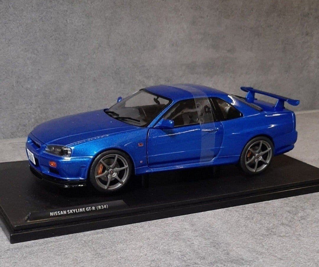 1:18/Nissan skyline GT-R(R34)NIEUW IN OVP, Ophalen of Verzenden, Zo goed als nieuw, Auto, Solido