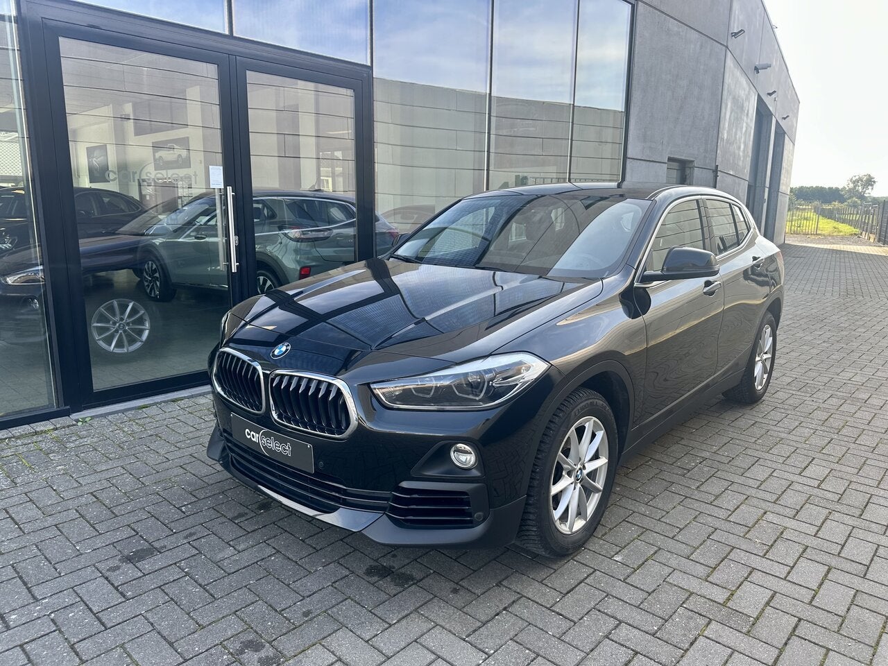 BMW X2 1.5 sDrive18i AUT 5d 100kW, Auto's, Zwart, Bedrijf, 5 deurs, Head-up Display