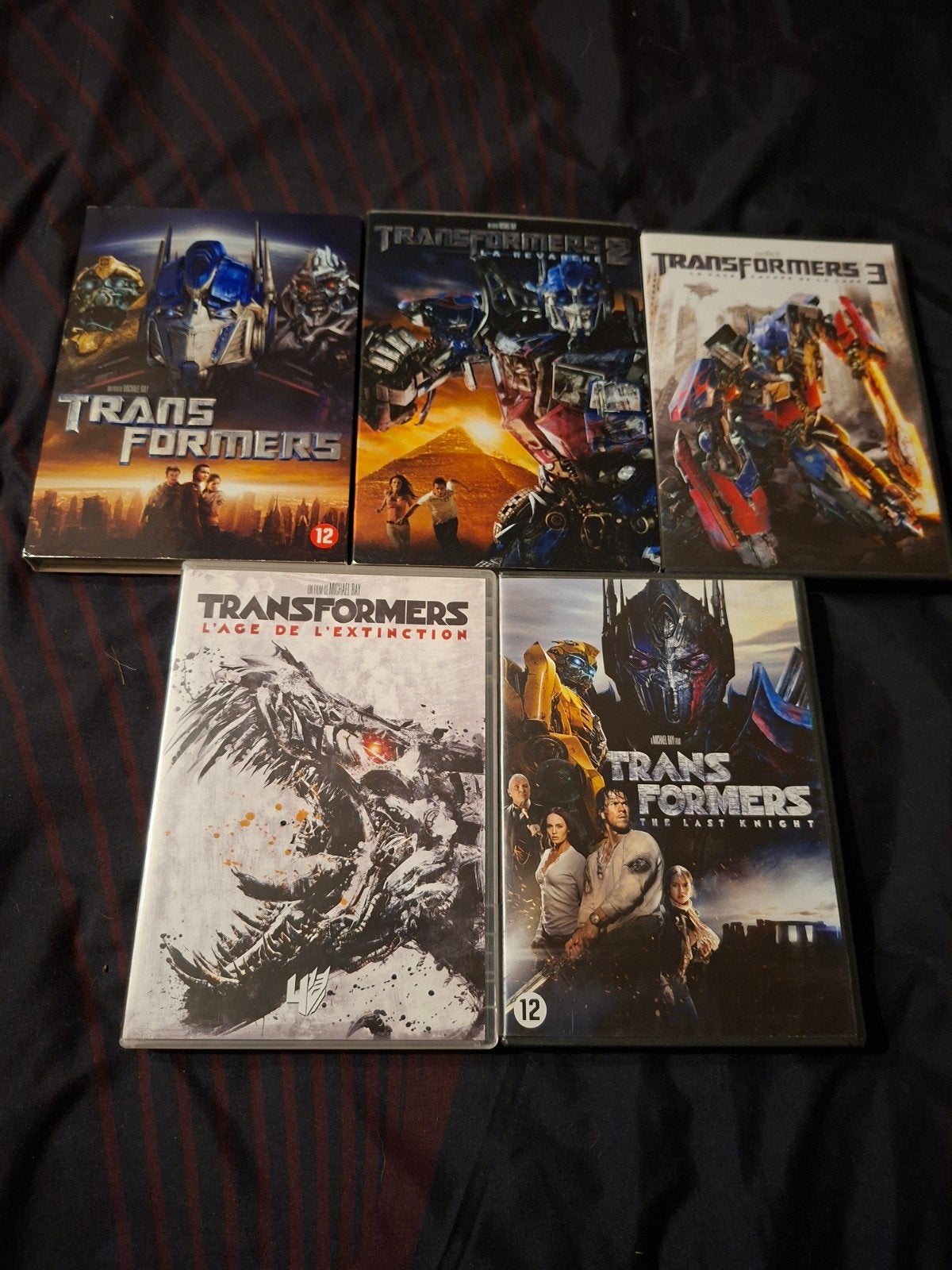 Te koop 5 Transformers DVD's, Cd's en Dvd's, Inclusief boekje, Ophalen of Verzenden, Zo goed als nieuw, Engels