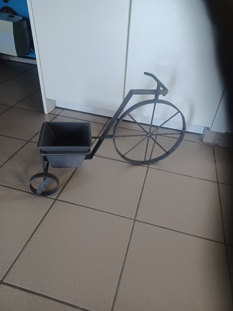 Fiets met plantenbakje (nieuw), Ophalen