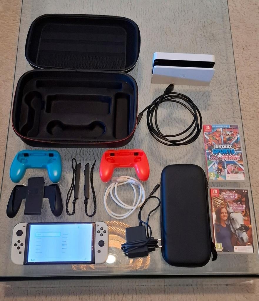 Nintendo Switch OLED. Met veel toebehoren en games., Games en Spelcomputers, Online, Ophalen of Verzenden, Zo goed als nieuw, 3 spelers of meer