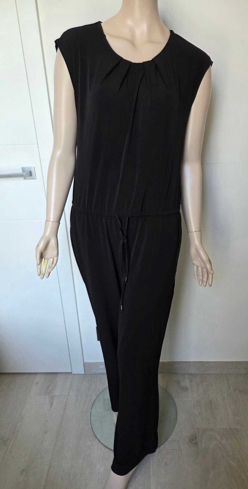 Zwarte jumpsuit Montego maat 44, Ophalen of Verzenden, Maat 42/44 (L)