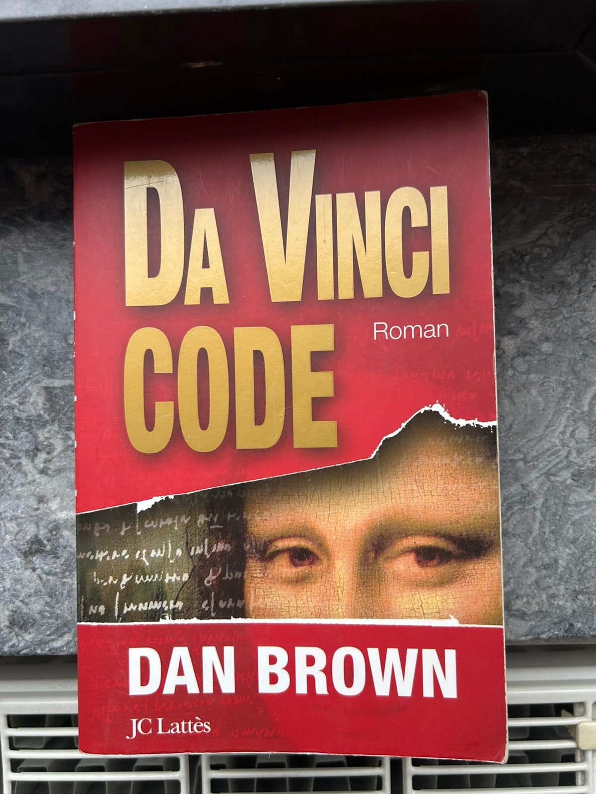 Da Vinci Code roman Dan Brown, Envoi, Comme neuf