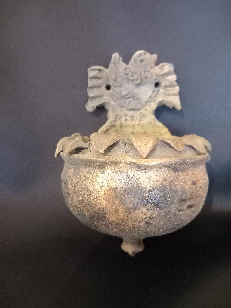 Wijwatervat, Ophalen