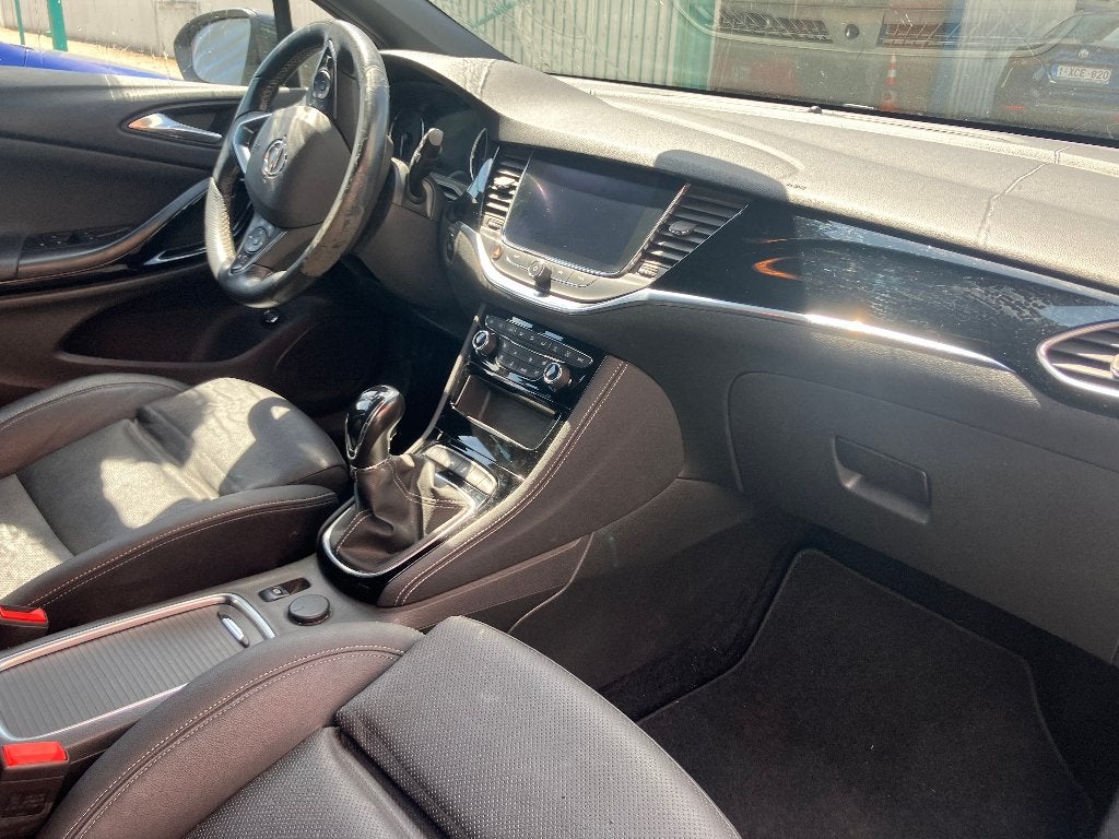 Opel Astra Sports Tourer 107 KW Ultimate, Auto's, Voorwielaandrijving, 1199 cc, Zwart, Leder