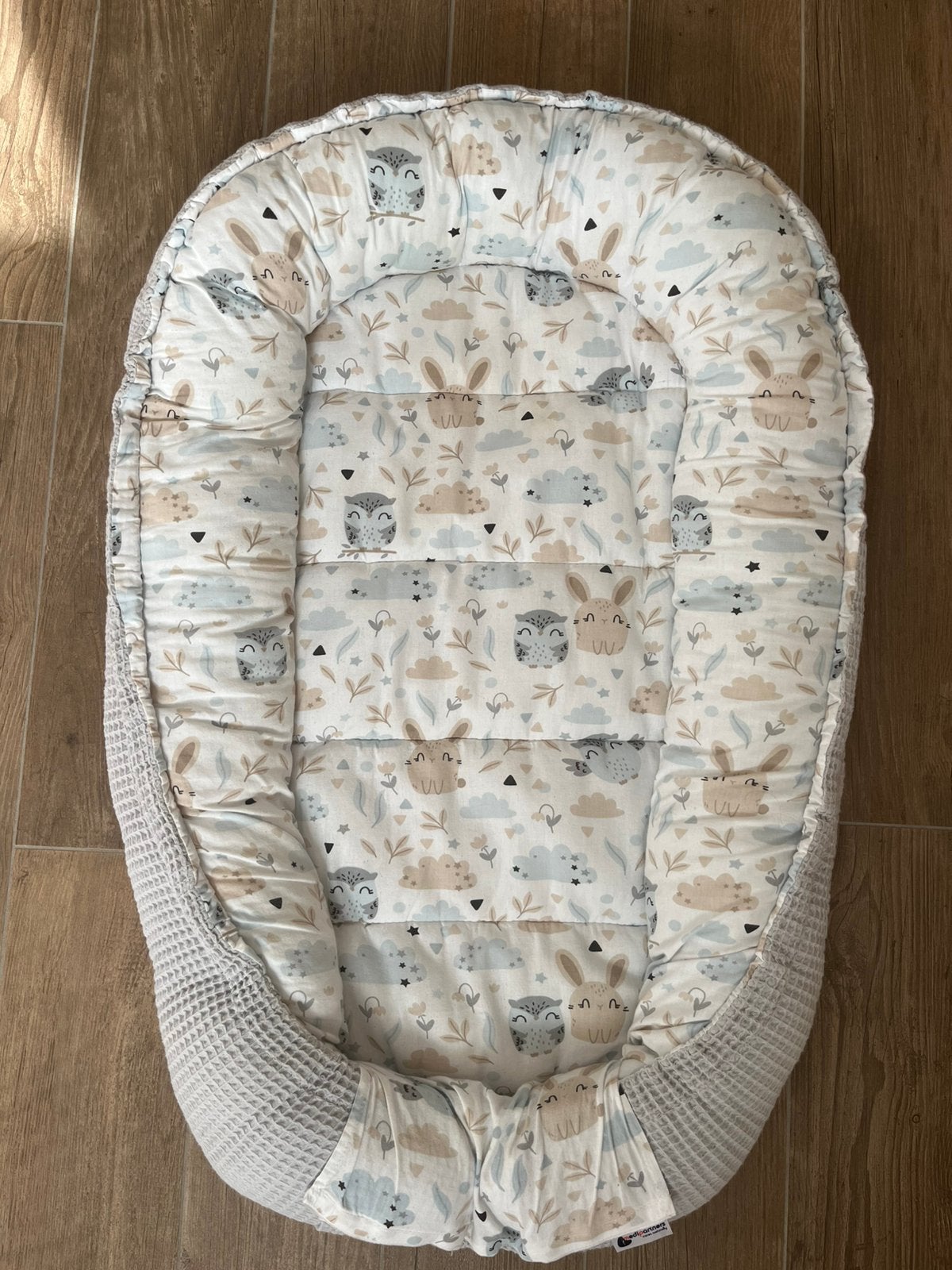 Medi Partners babynestje – uilen, konijntjes & bloemen, Ophalen, Gebruikt