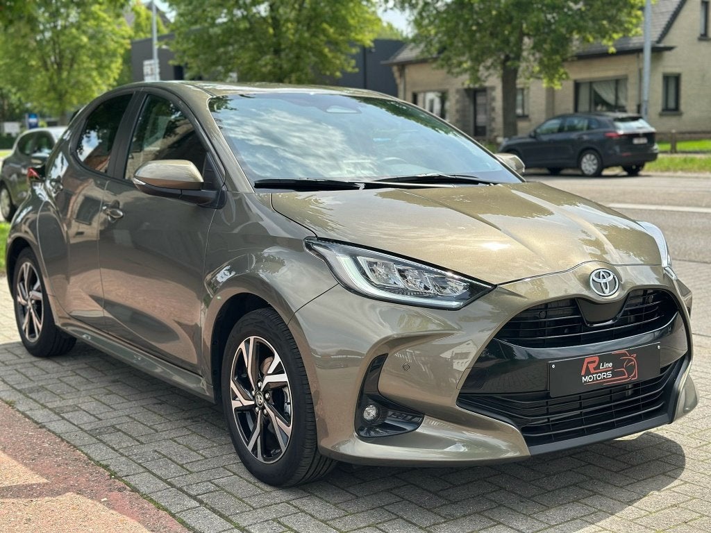 Toyota Yaris 1.5i Dual Iconic Plus - 5300KM - Automaat -, Autos, Toyota, Argent ou Gris, Achat, Entreprise, Entretenue par le concessionnaire