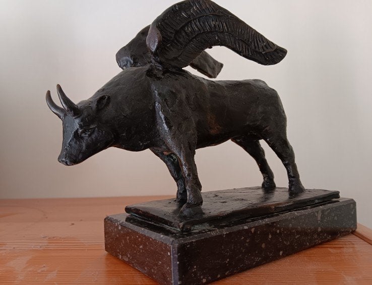 Bronzen kunstwerkje, Ophalen