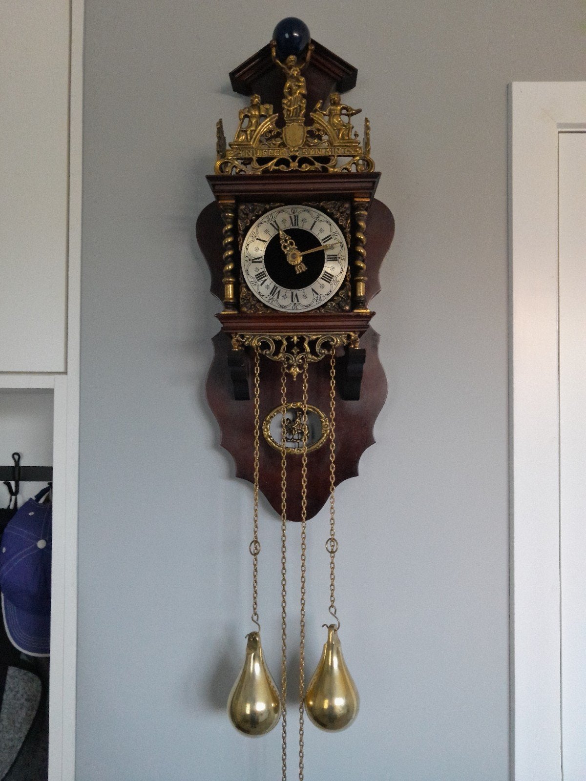 zaanse wandklok, Ophalen