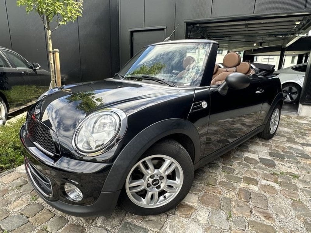 MINI One Cabrio 1.6i One Cabrio,BRUIN LEDER/Garantie, 4 zetels, Euro 6, Zwart, https://public.car-pass.be/vhr/96a00a23-07fa-4d3b-92d1-3b44edc85b84