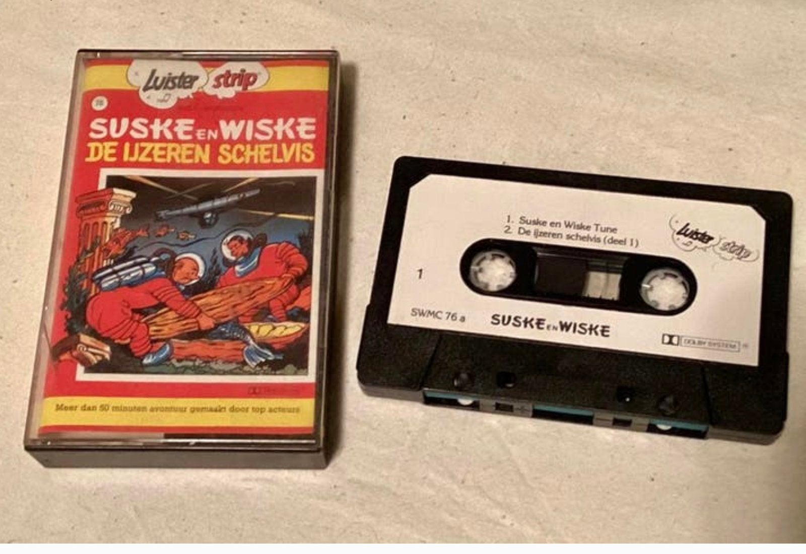 ♦️S&W🗯️ Luister Strip DE IJZEREN SCHELVIS 📼🎶, Verzamelen, Verzenden, Zo goed als nieuw
