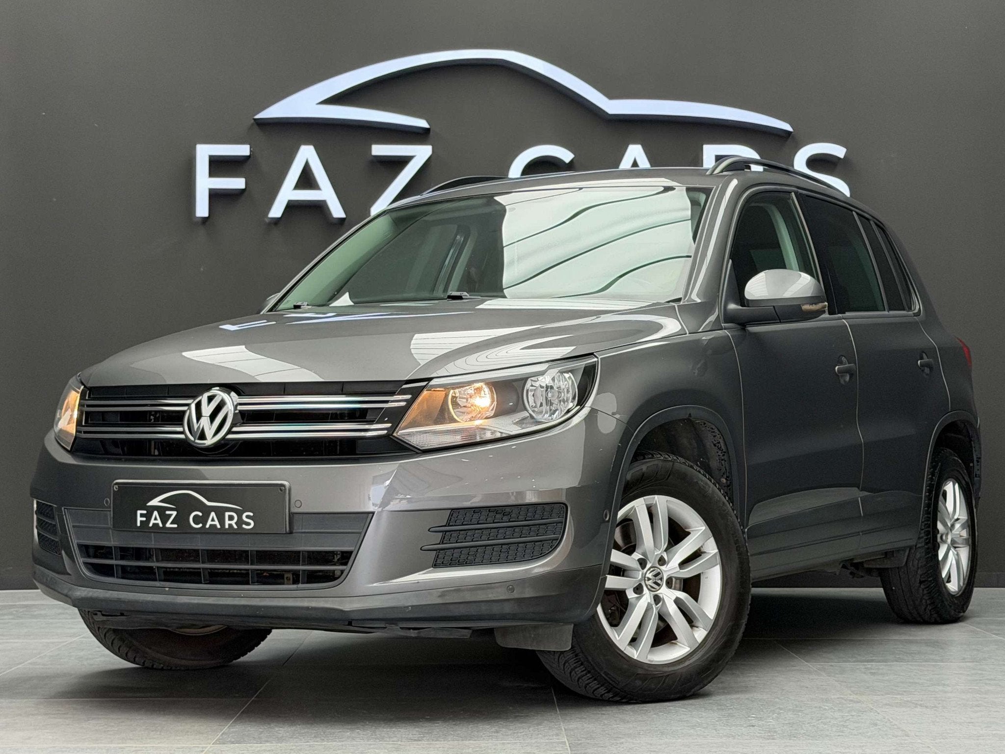 Volkswagen Tiguan 2.0 CR TDi * 1ER PROP + CLIM + GARANTIE *, Euro 5, Stof, Gebruikt, Zwart
