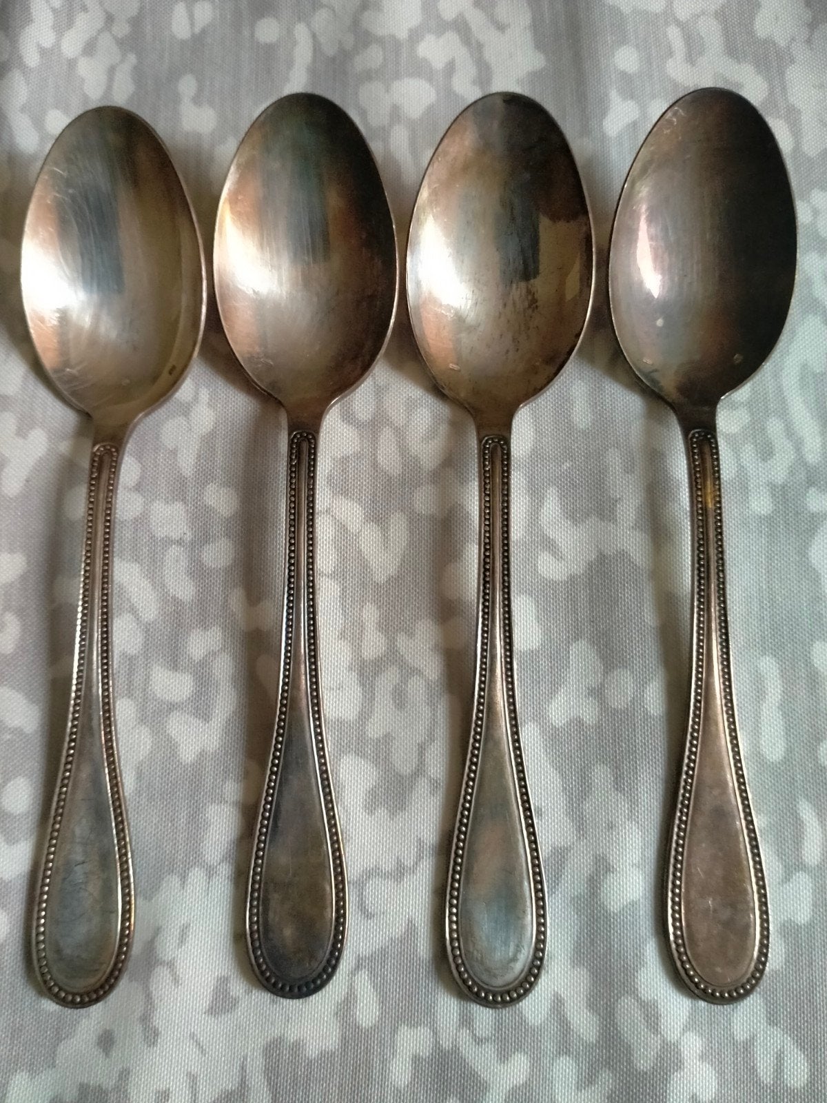 4 antieke soeplepels, Ophalen