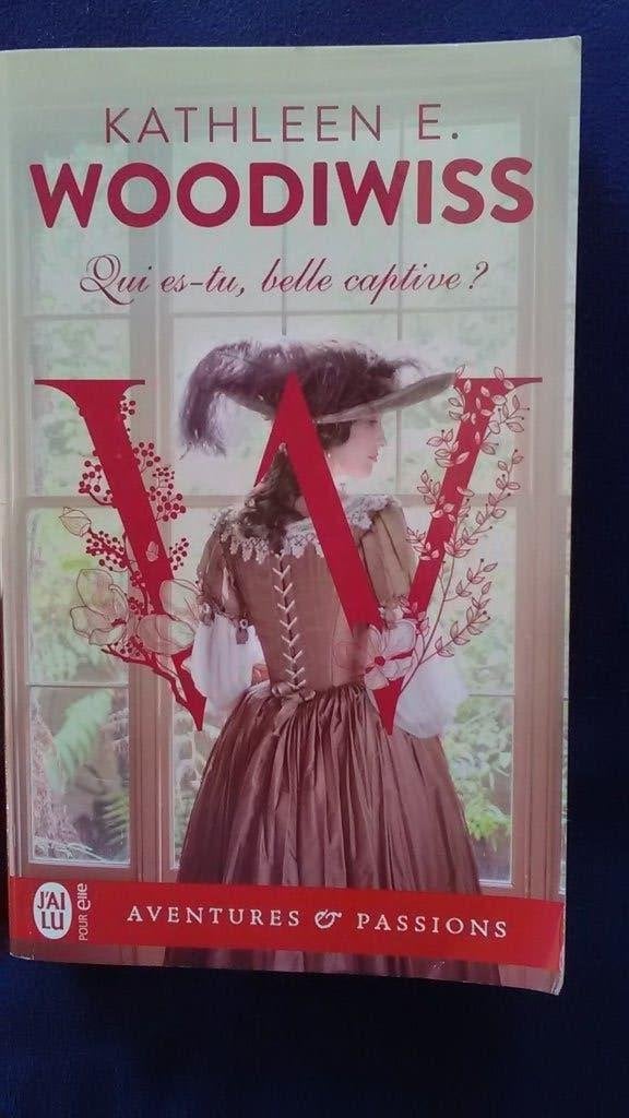 „Wie ben jij, mooie gevangene?” Kathleen E. Woodiwiss 1989, Nieuw, Kathleen E. Woodiwiss, Ophalen of Verzenden, Amerika