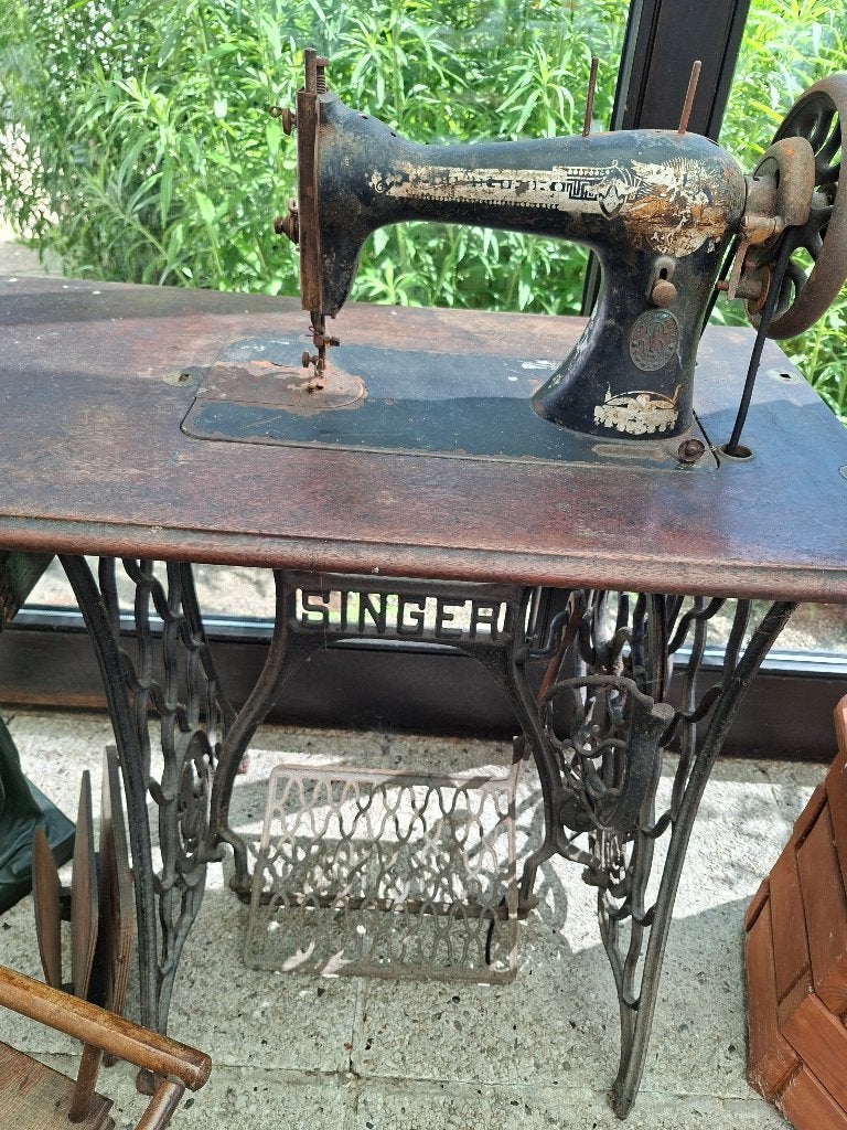 antieke Singer naaimachine, Enlèvement