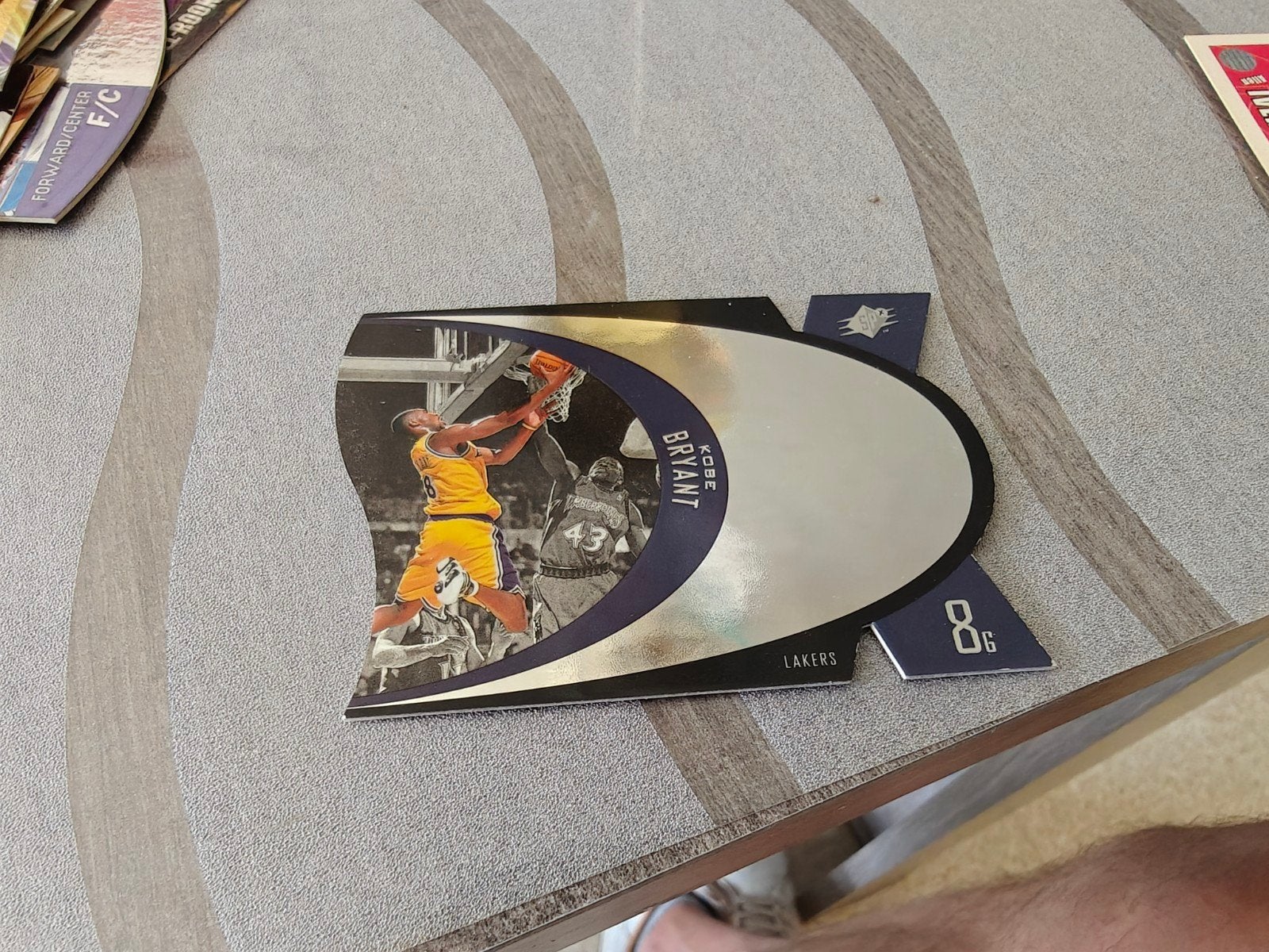 Kobe Bryant collector card, Ophalen