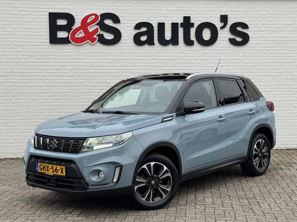 Suzuki Vitara 1.5 Hybrid Style AllGrip Adaptive cruise Clima, Auto's, Suzuki, Automaat, Blauw, Bedrijf, Grijs
