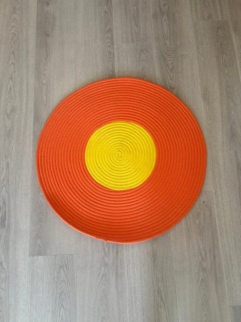 ronde mat oranje met geel Ikea 'Stickat', Huis en Inrichting, Stoffering | Tapijten en Vloerkleden, Ophalen, 50 tot 100 cm, Rond