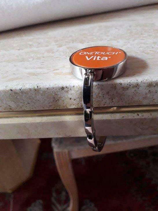 Gadget van OneTouch Vita om handtas aan tafel te hangen, Verzamelen, Merken en Reclamevoorwerpen, Ophalen of Verzenden, Nieuw
