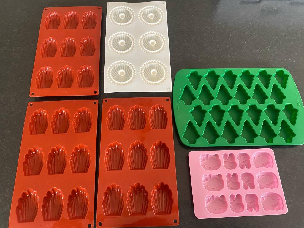 6 siliconen bakvormen - madeleines / Hello Kitty / kerst / t, Ophalen of Verzenden, Zo goed als nieuw, Taarten of Cupcakes, Bakvorm