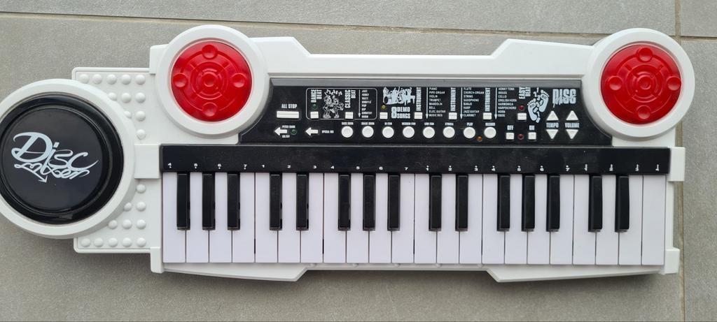Disc Mixer-toetsenbord, een elektronisch .muziekspeeltje, Ophalen