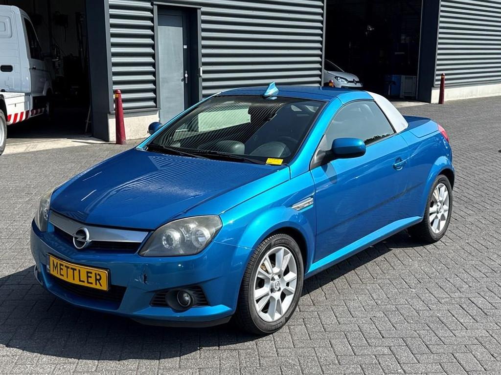 Opel Tigra TwinTop 1.8-16V Cosmo, Airco, NAP, Cabrio, Auto's, Voorwielaandrijving, Gebruikt, Blauw, 185 g/km