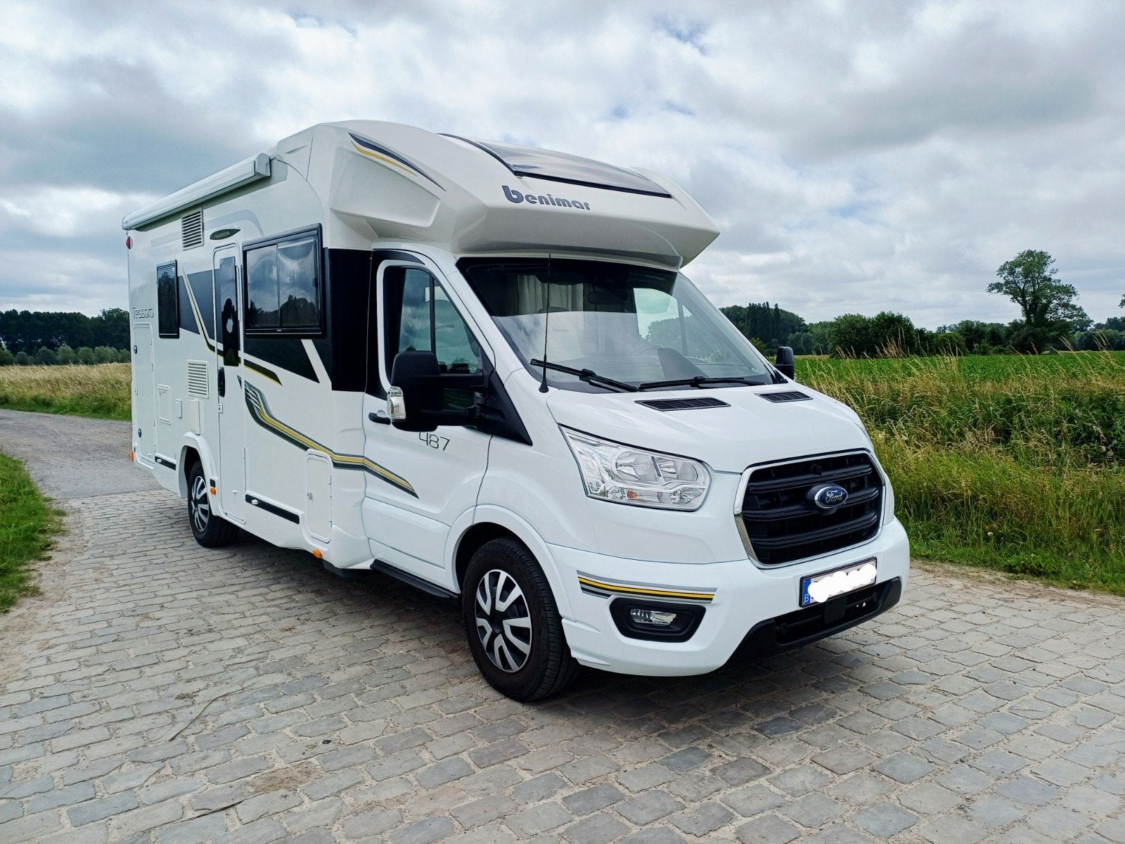 Ford Benimar 487  nieuw staat, Caravans en Kamperen, Ringverwarming, Antidémarrage, Ford, 6 tot 7 meter
